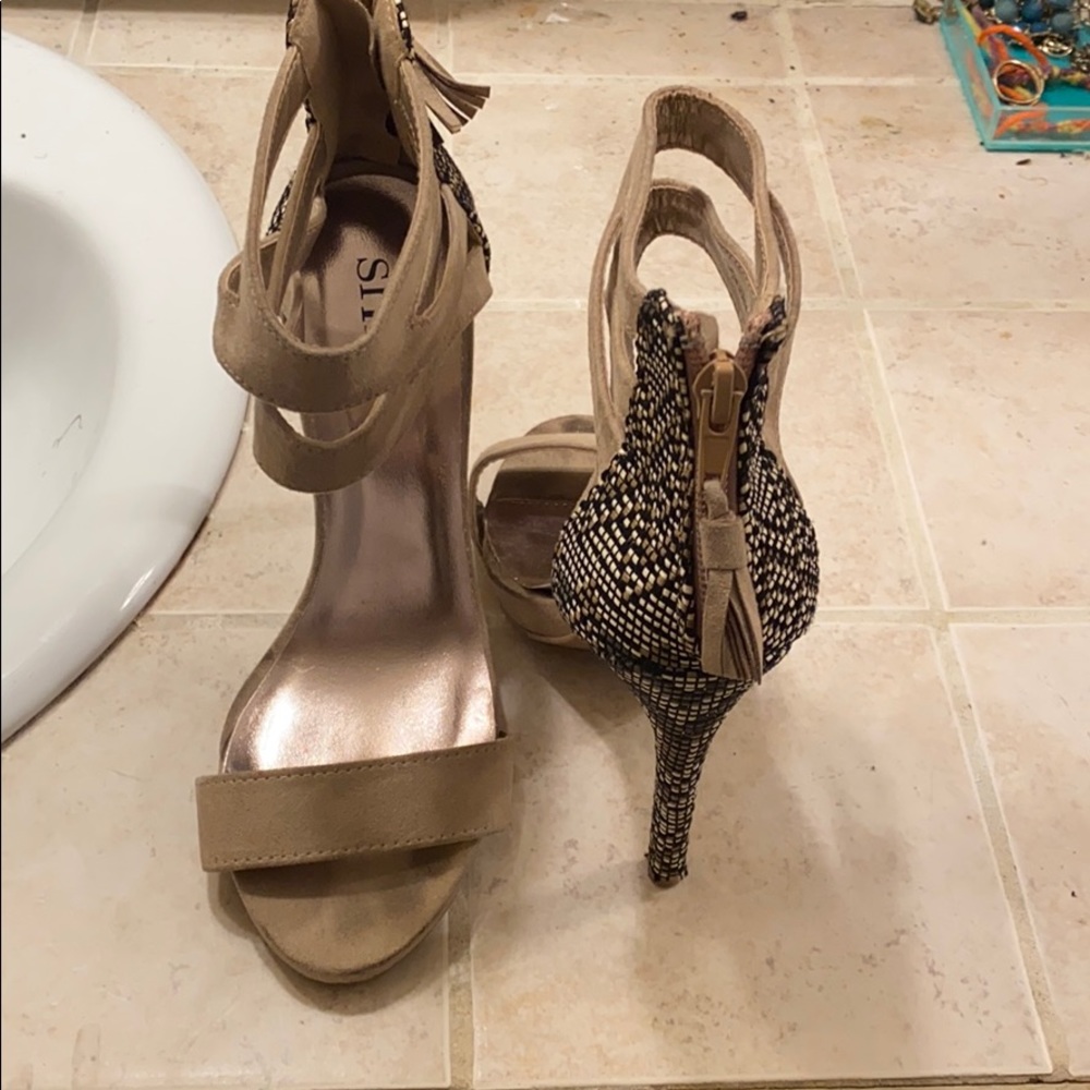 Nude and black stilettos